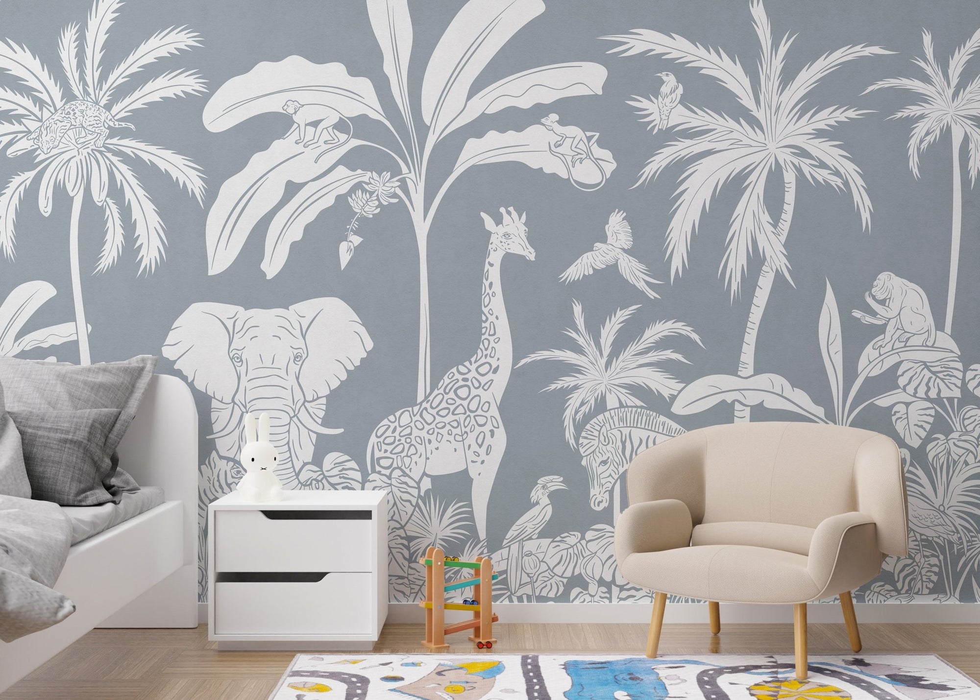 Monochrome jungle blue wall mural with wildlife pattern wallpaper design.