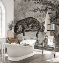 Large scale leopard wall mural in a bright bathroom with a classic white tub.
