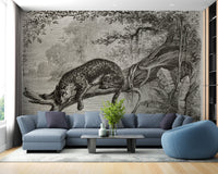 Monochrome Leopard Wall mural in a modern living room with a blue sectional sofa.