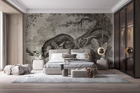 Wild leopard wall mural behind a large bed in a contemporary grey bedroom.