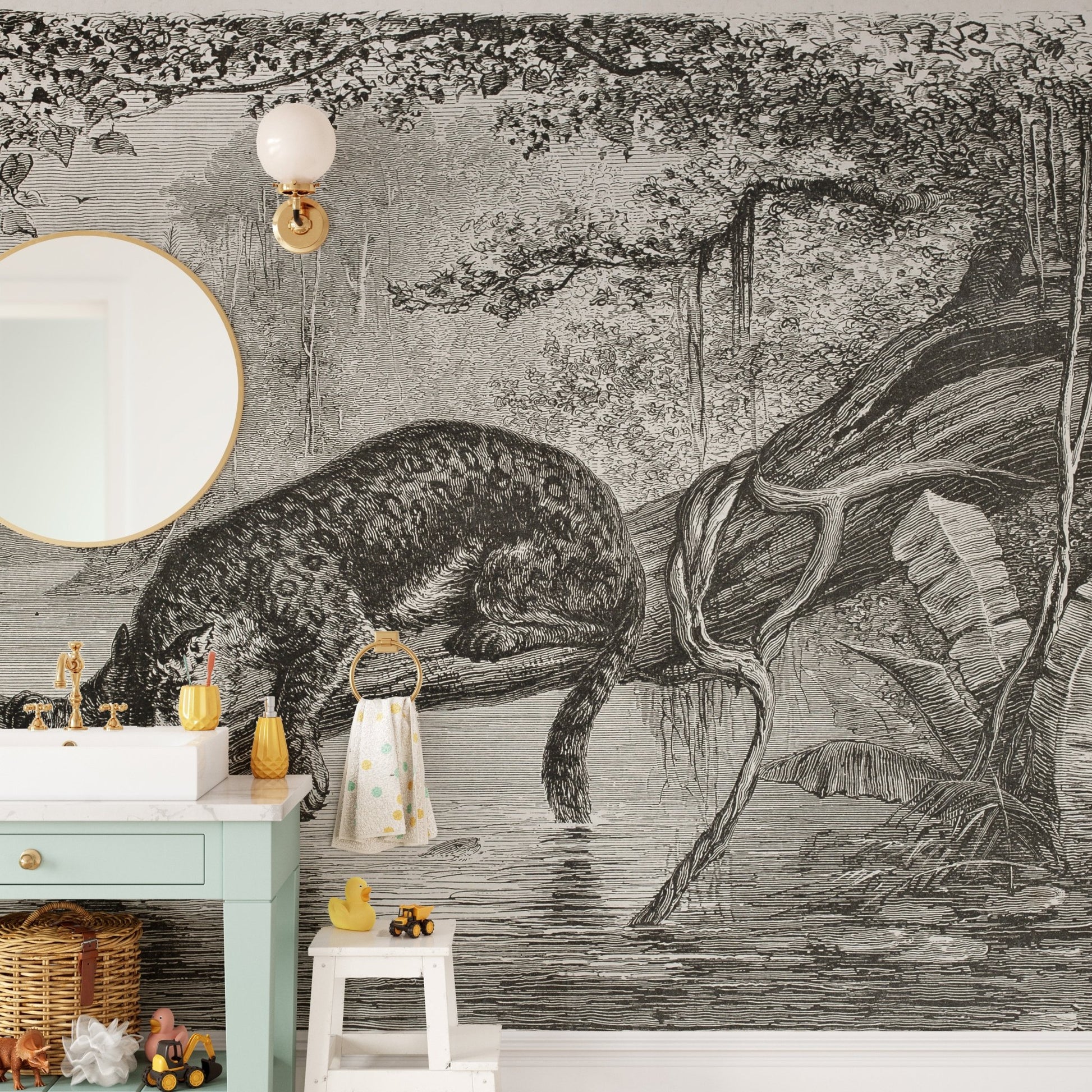 Detailed leopard wall mural behind a mint green vanity and round mirror.