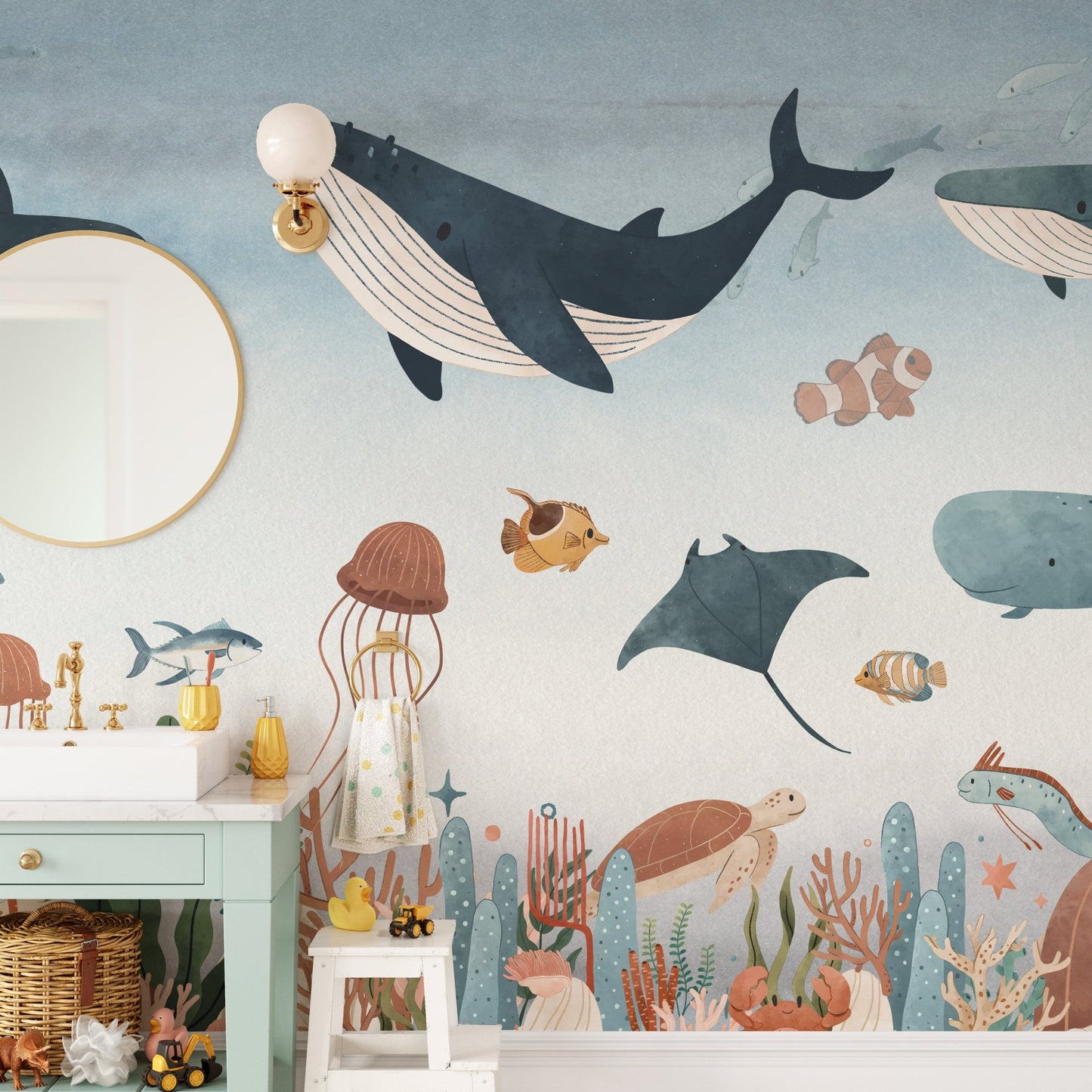 Realistic underwater scenery wall mural in room with mirror and sink.