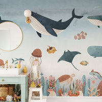 Realistic underwater scenery wall mural in room with mirror and sink.