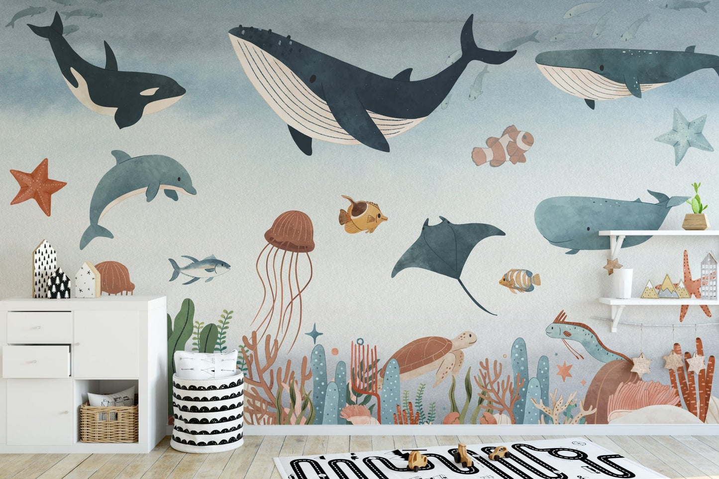 Underwater animal wall mural featuring a large whale and coral reef in kids area.