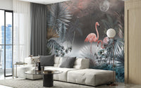 Grey and blue tropical leaves wall mural in a bright living space.