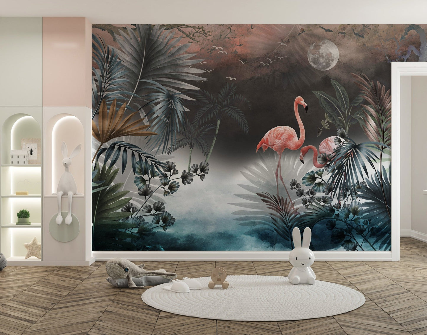 Dark botanical leaves wall mural with pink flamingo accents in a large open kids area.