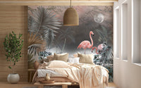 Tropical monstera wall mural in a cozy bedroom with neutral bedding.