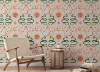 Sophisticated Boho design wallpaper with celestial and snake patterns in reading area.