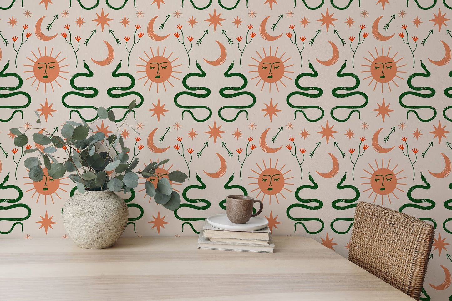 Moon, sun, and snakes in Boho wallpaper for dining interiors.