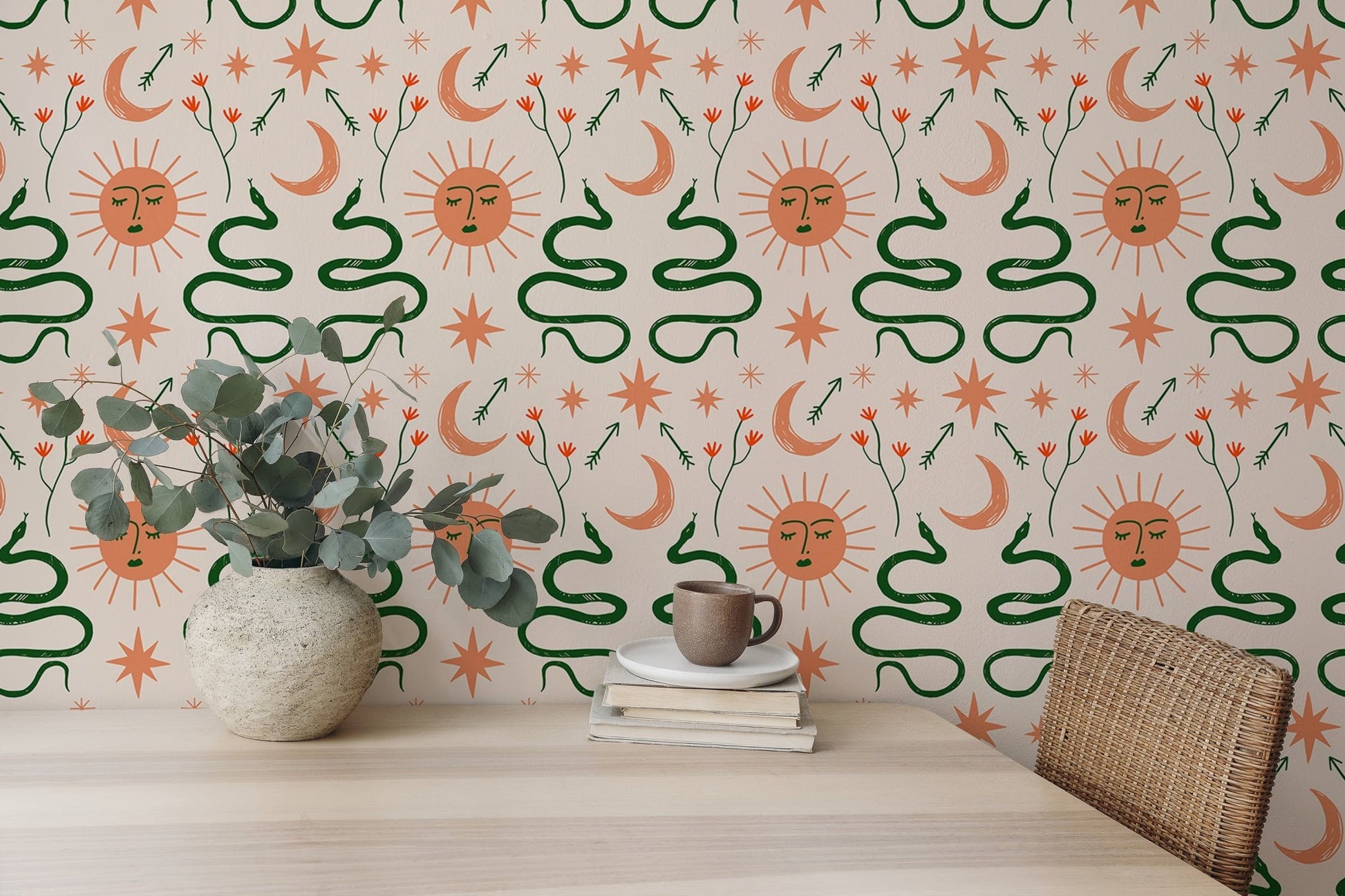 Moon, sun, and snakes in Boho wallpaper for dining interiors.