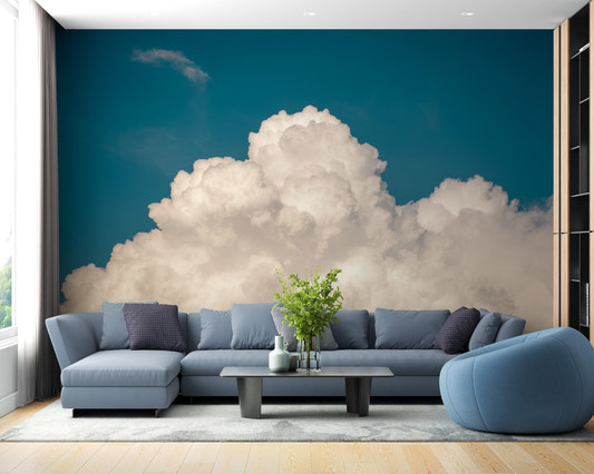 Morning Sky with Bizarre Clouds Wall Murals behind a blue sofa in a living room.