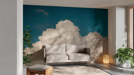 Large white cumulus cloud mural on a dark teal wall in a modern flat.
