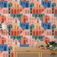 Terracotta and peach building wallpaper behind a light wood sideboard.