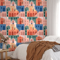 Moroccan Oriental Streets wallpaper in a bedroom with a brown throw blanket.