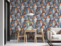Large scale mountain wallpaper on living room wall with neutral sofa.