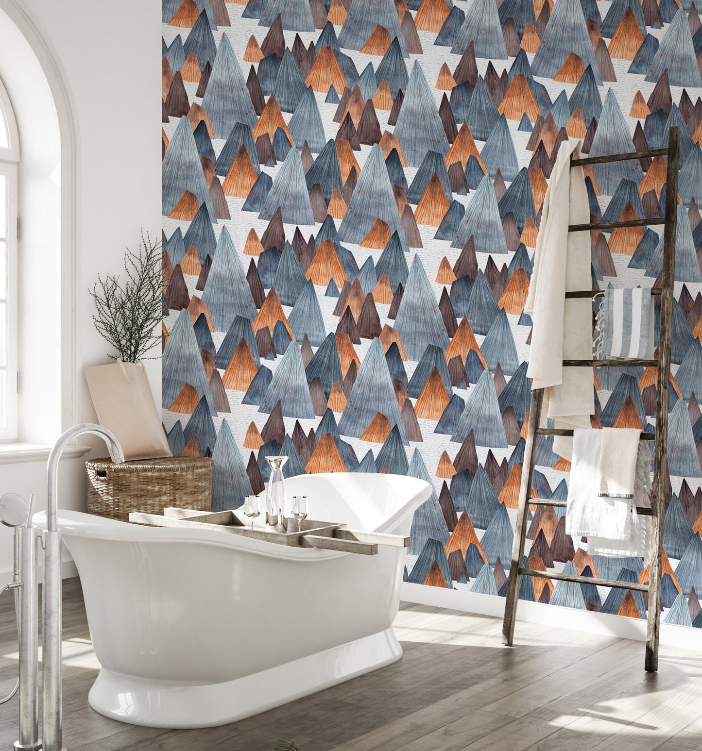 Waterproof mountain landscape wallpaper in bathroom with white tub.