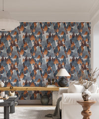 Alpine peak adventure wallpaper behind wooden desk and minimalist chair.