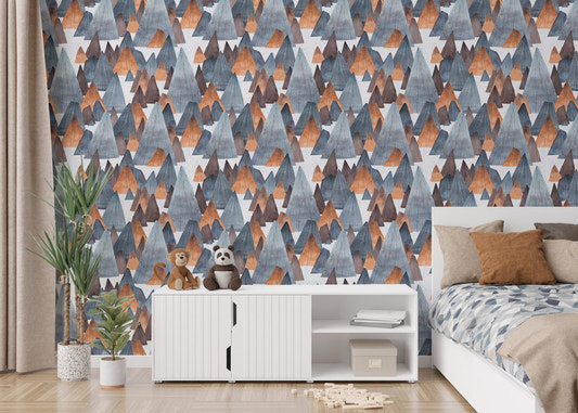 Mountain landscape adventure wallpaper in kids bedroom with white furniture.