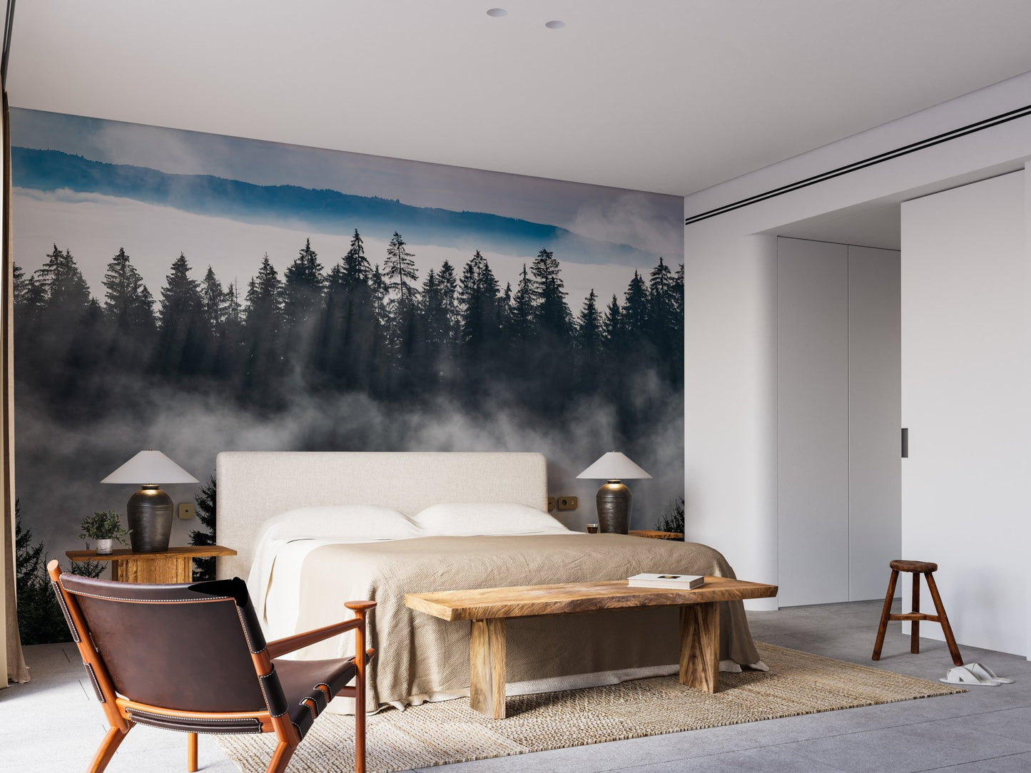Contemporary bedroom showing a bed with a foggy mountain wall mural headboard.