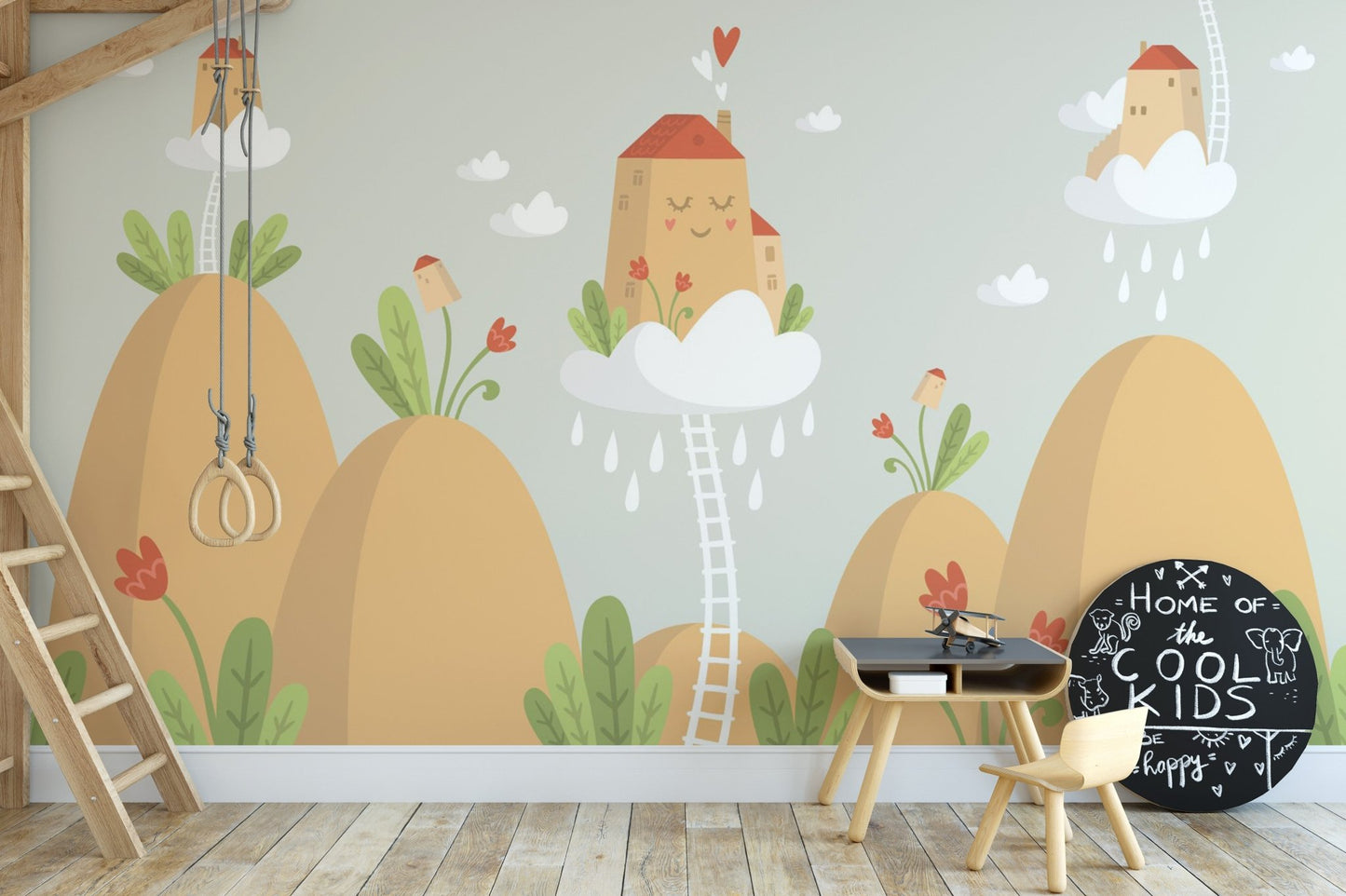 Children's study area wall mural featuring orange mountains and a wooden ladder.