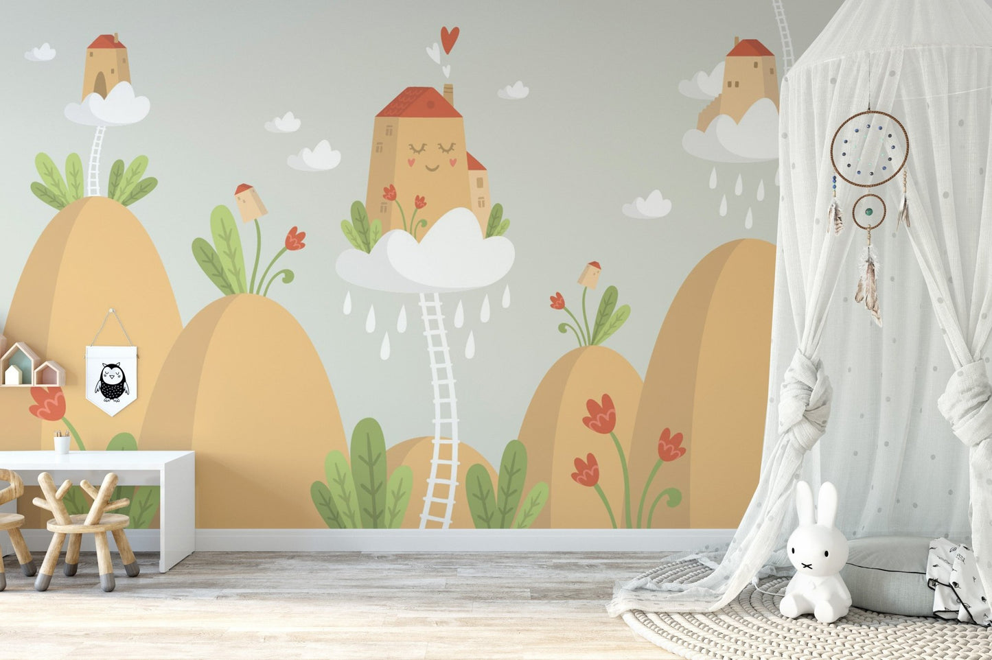 Playroom earthy tone wall mural with a white desk and decorative dreamcatcher.