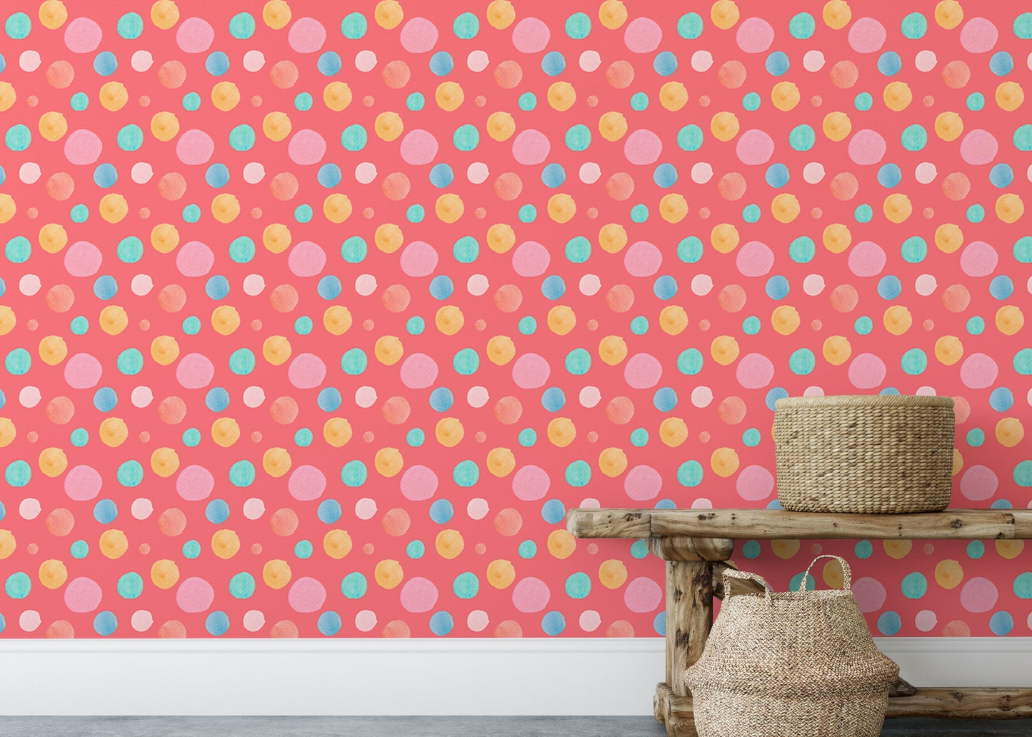 Pink and blue circle wallpaper used as a backdrop for a wooden bench.