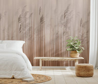Abstract nature wall mural with reeds and vertical streaks in warm hues.