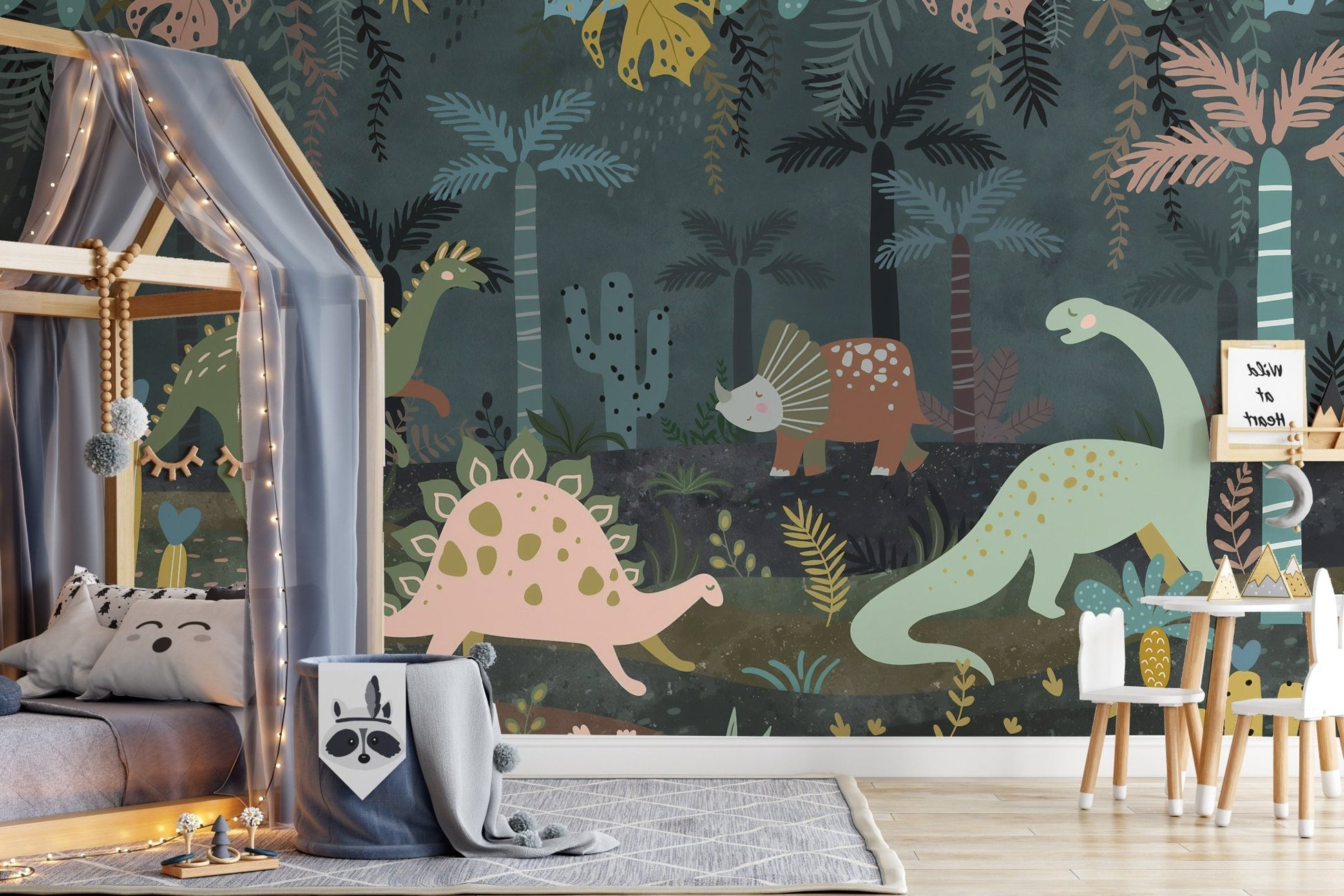 Playroom wall mural with pink and green dino on dark teal.