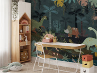 Study desk set against a prehistoric dino scene wall mural with palm trees.