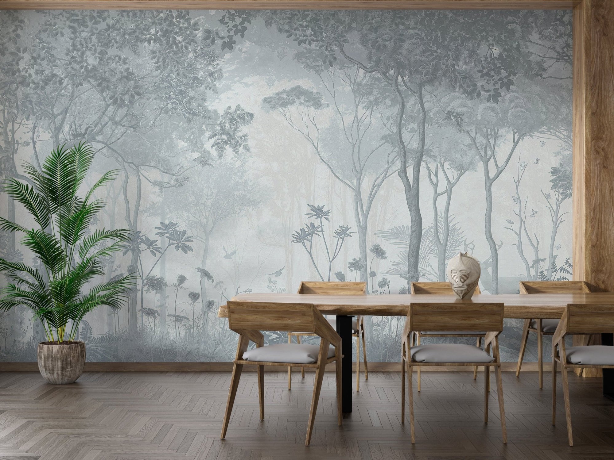 Mystical foggy forest mural in a dining room with a long wooden table.