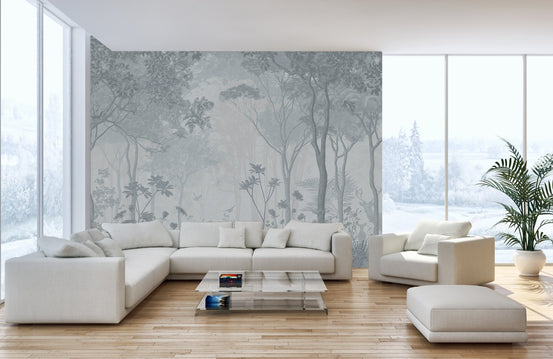 Mystical Fog Forest Wall Mural in a living room with a white sectional sofa.