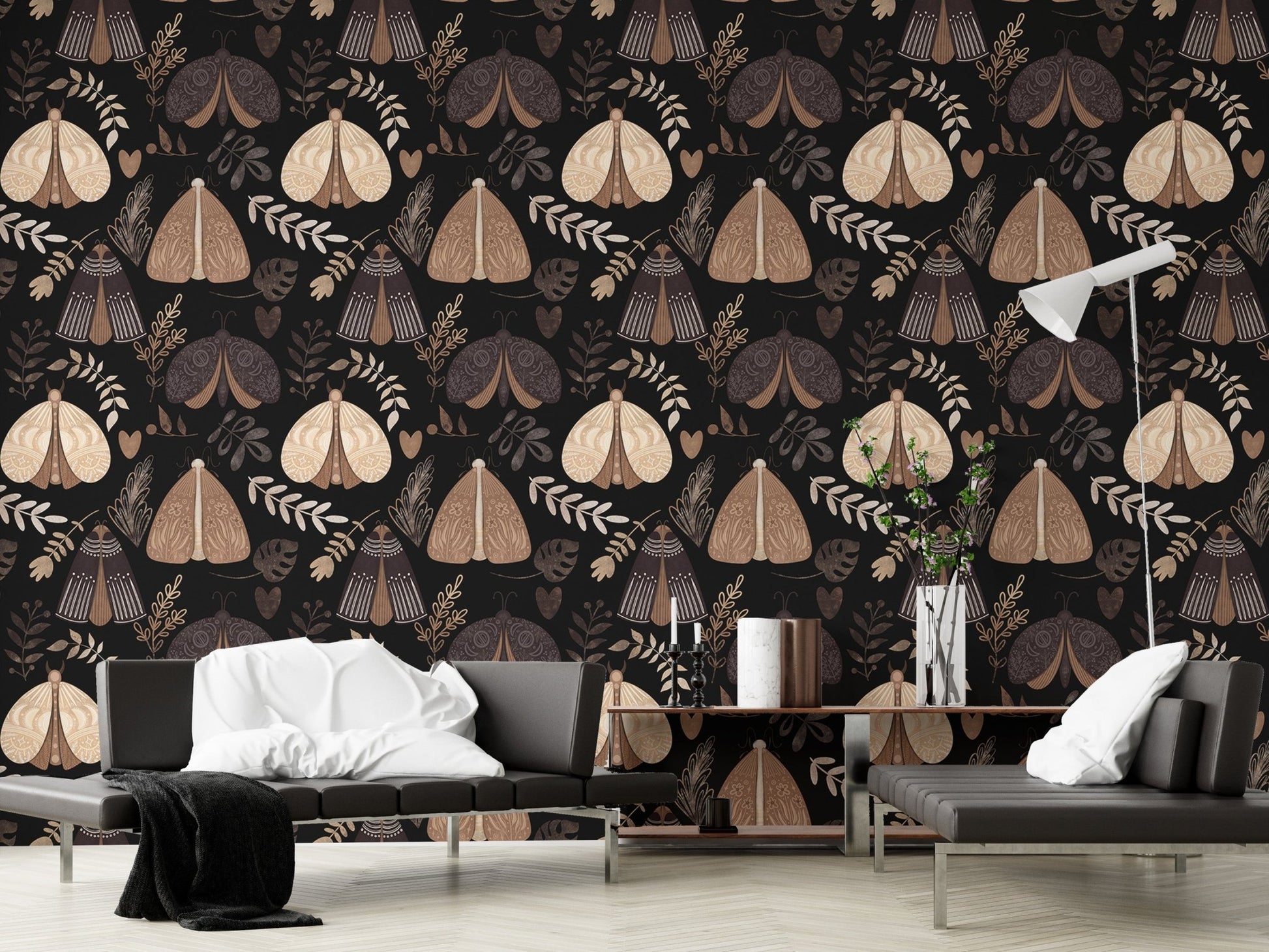 Black and beige moth wallpaper in a modern living room with grey sofa.