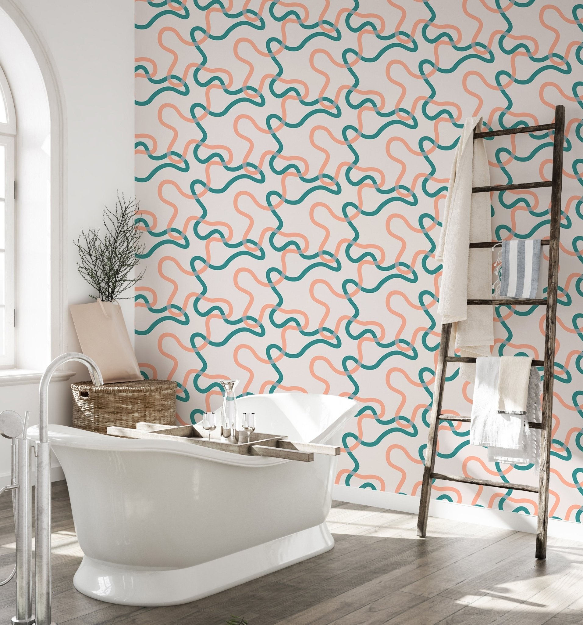 Teal and orange geometric squiggle wallpaper in a minimalist bathroom setting.