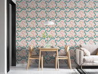 Naive Boho Green and Orange Lines Wallpaper used as a feature wall in a dining area.