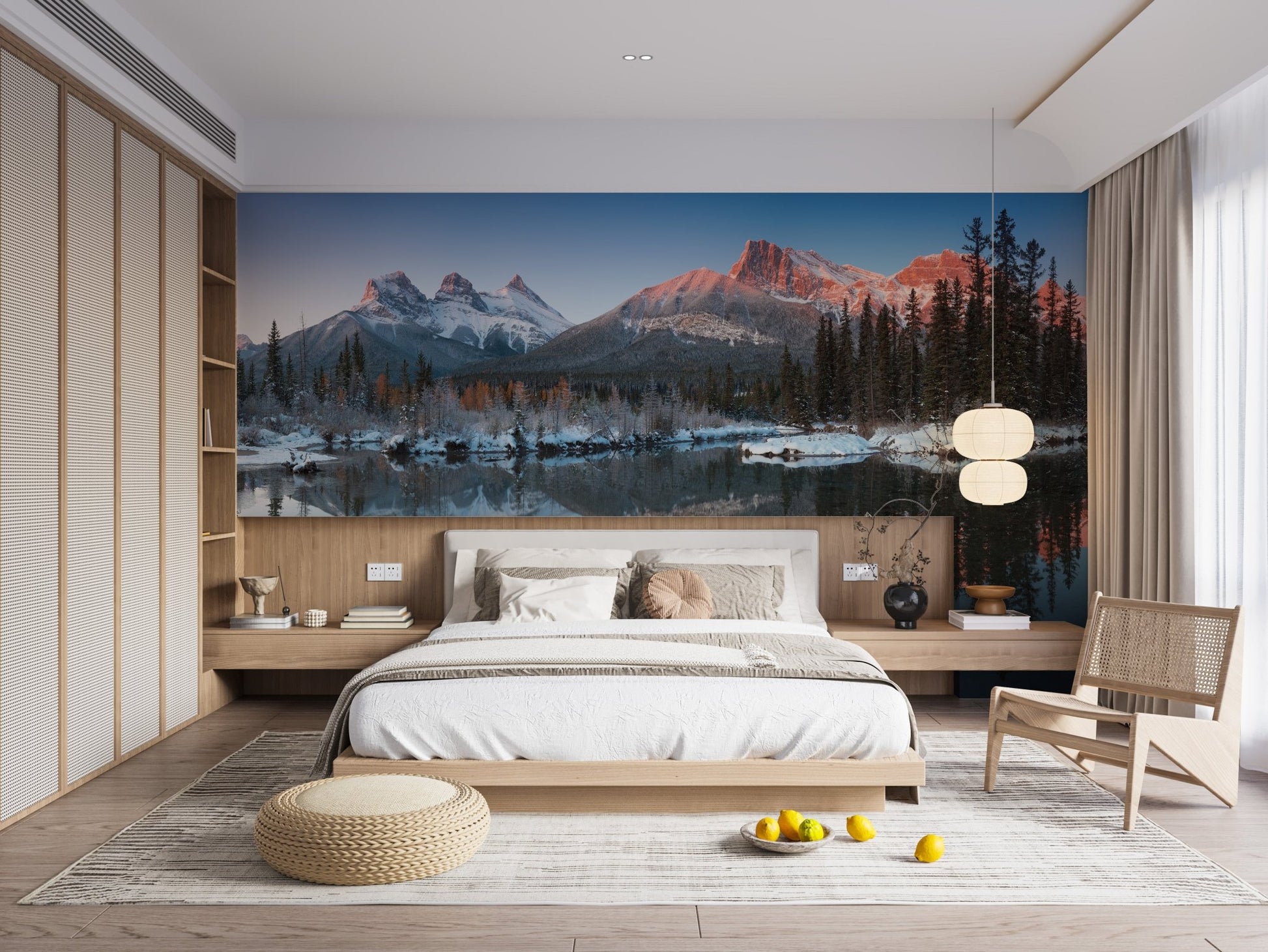 Bedroom with a wide alpine mountain wall mural.