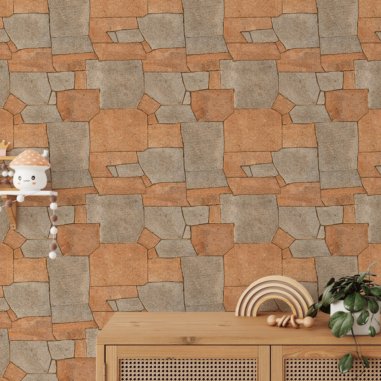 Stone pavement wallpaper behind a light wood cabinet and small plants