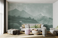Oil painting style mountain wall mural in a contemporary living space.