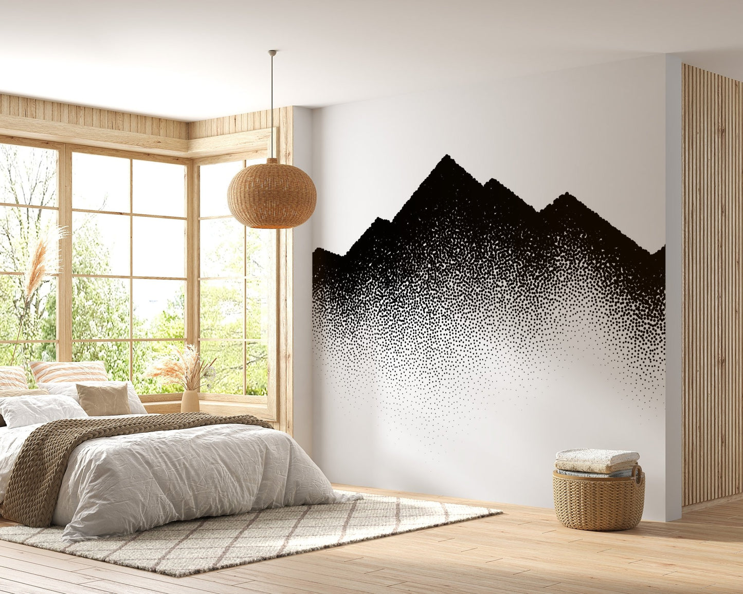 Dotted alpine wall mural behind a wooden bed frame in a bright bedroom.