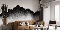 Gradient dot mountain wallpaper in a spacious living room with a tan leather couch.
