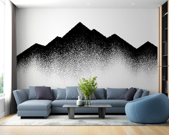 Black dotted mountain wall mural in a modern living room with a blue sectional sofa.