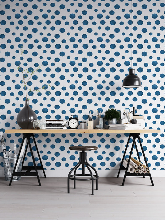 Navy Blue Indigo Watercolor Polka Dots Wallpaper in a home office with a wooden desk.
