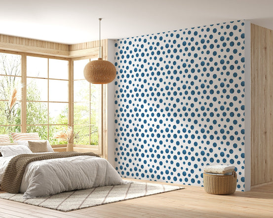 Navy Blue Indigo Watercolor Polka Dots Wallpaper in a bedroom with natural light.
