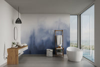 Subtle watercolor wall mural in navy blue and white tones.