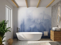 Abstract navy blue and white gradient wall mural in a washroom.