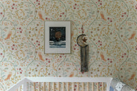 Newill Peppermint Russet Flower Wallpaper in a nursery above a white wooden crib
