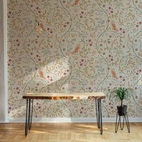 Newill Peppermint Russet Flower Wallpaper behind a wooden console table in a hallway