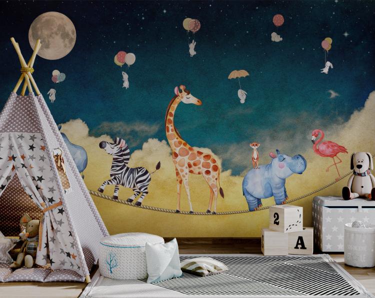Blue starry night wall mural with animals on a tightrope for playrooms.
