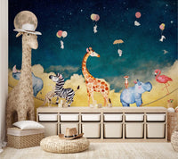 Starry night wall mural with safari animals and balloons.