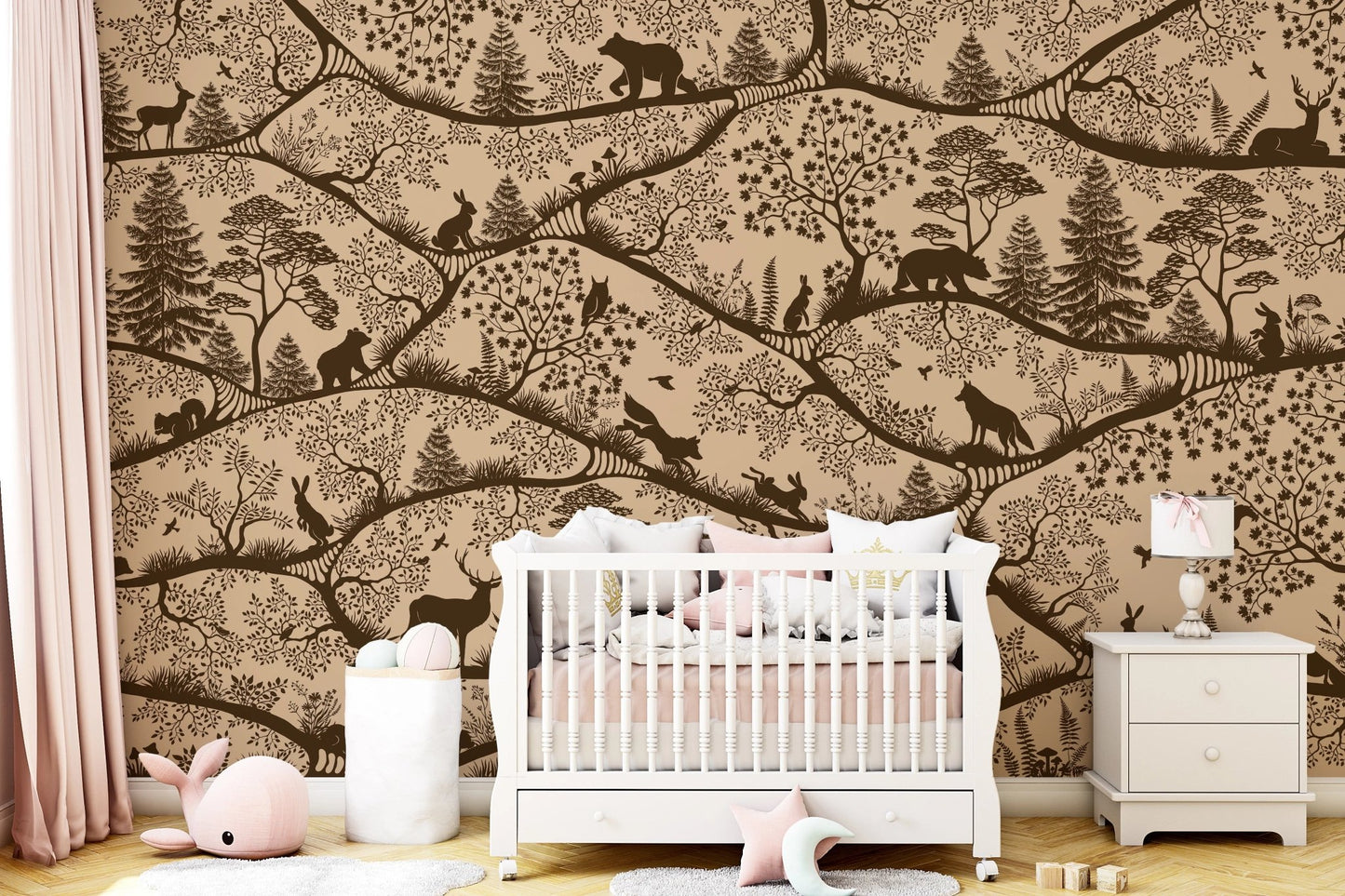 Detailed animal forest wall mural in a bright nursery with a white wooden cot.