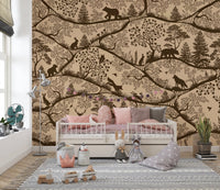 Brown woodland wall mural in a child's bedroom with pink bedding and a white bed.